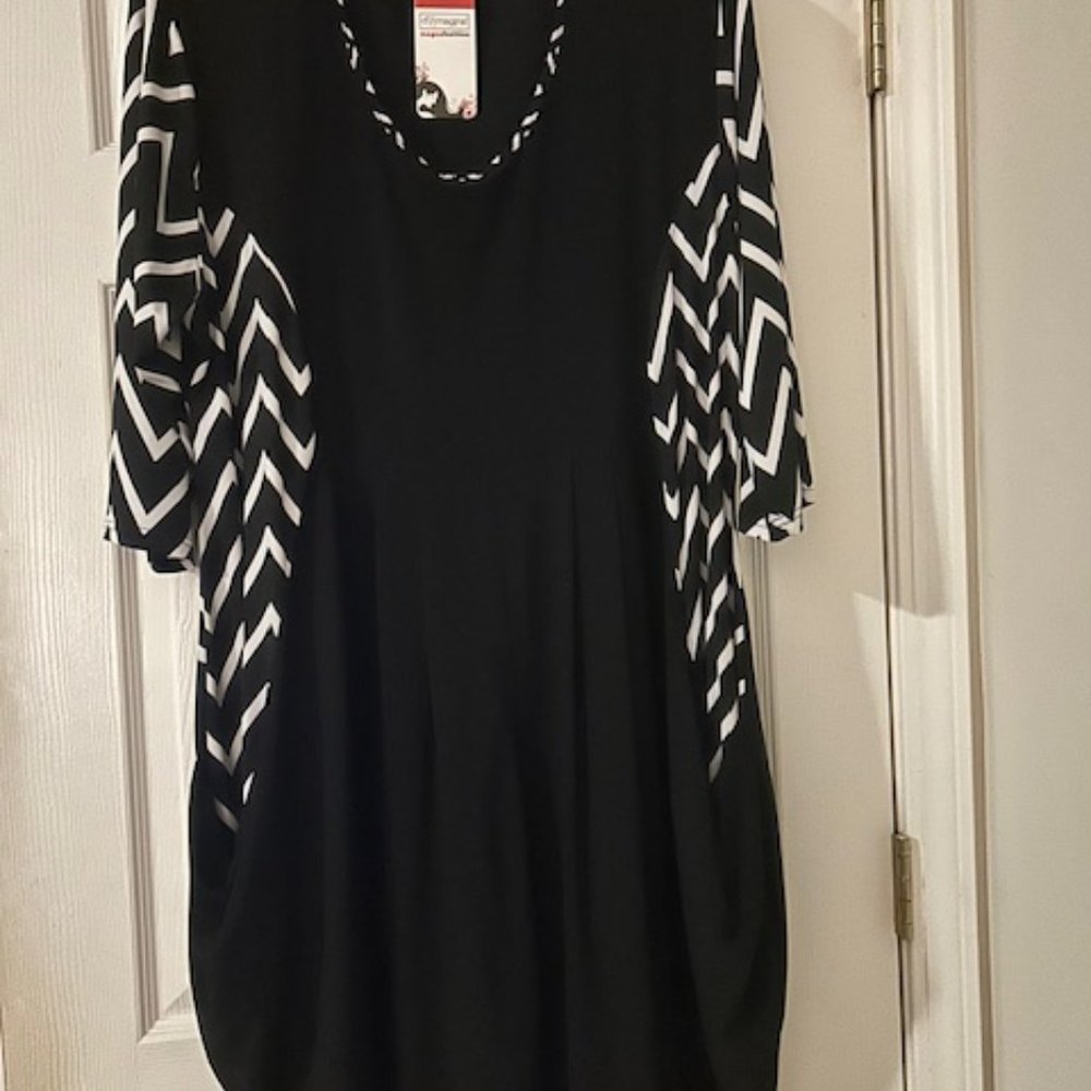 Black dress with white and black sleeves